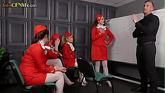 A Group Of Female Flight Attendants In Cfnm Roles Perform Oral Sex On A Man In A Bdsm-Themed Orgy